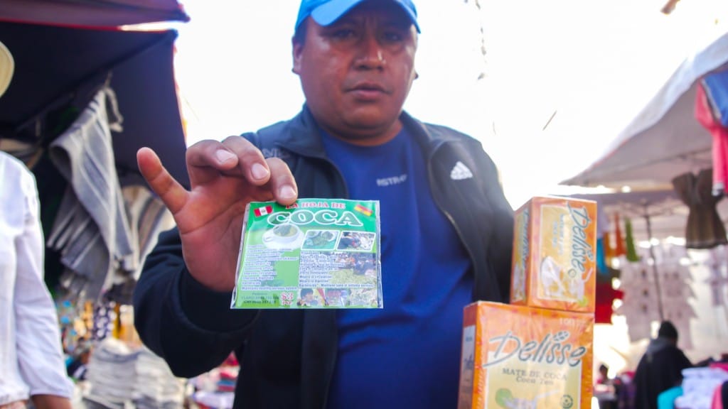 Otavalo man selling coca candy